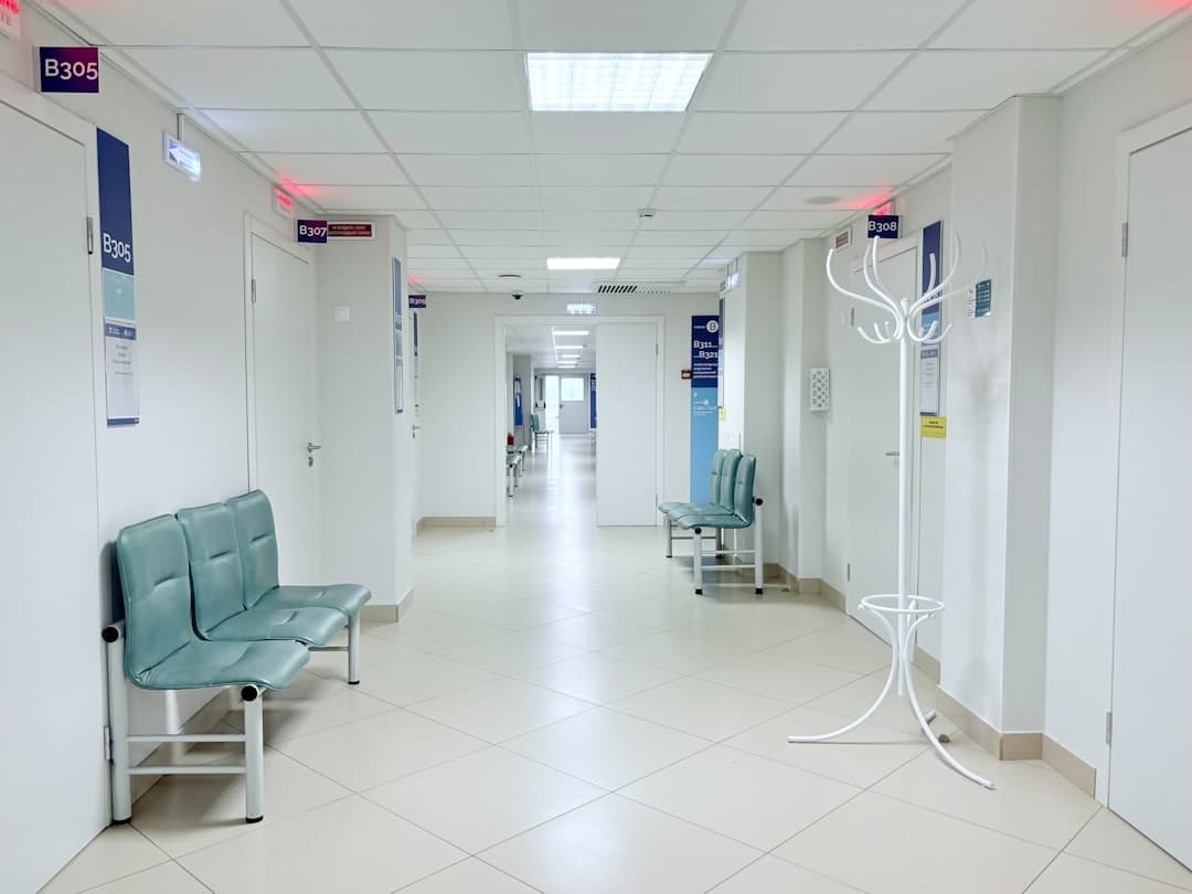 A modern clinic reception and patient waiting area